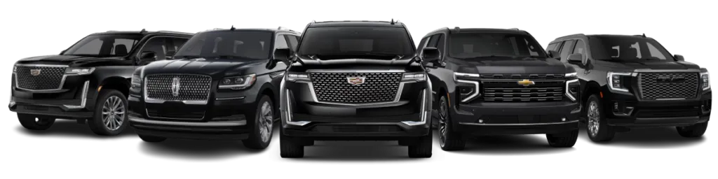 Five black SUVs lined up in darkness.